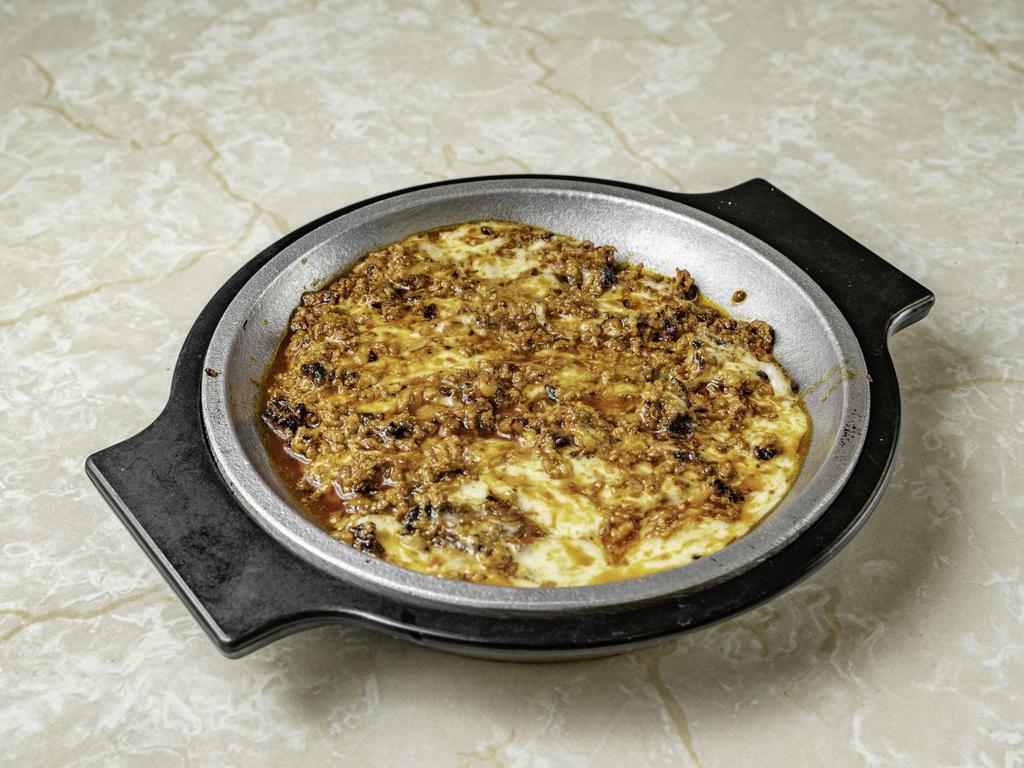 Queso Fundido · Melted cheese with or without Mexican sausage.