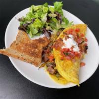 Denver Omelette · Stuffed with Seared Steak, Sausage, Bacon, Jack Cheddar Cheese, Mushrooms, Tomatoes and Onio...