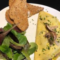 Mushroom Omelette · Stuffed with Mushrooms, Shallots and Swiss Cheese. Topped with Shallots, Herbs, and Truffle ...