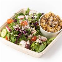 Shawarma Salad · Marinated chicken, spit roasted and shaved thin, served with pickles and herbs, gem lettuce,...