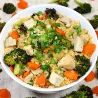 Cauliflower Rice Stir Fry · Ginger cauliflower rice, diced chicken breast, carrot, roasted broccoli, peas, scallion, gin...