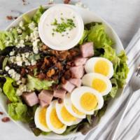 Protein Cobb Salad · Butter lettuce, avocado, hard-boiled egg, crispy bacon, diced ham, crumbled bleu, white pepp...
