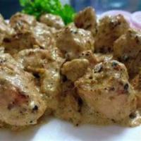 MALAI CHICKEN TIKKA · Tender boneless pieces of chicken breast marinated in slightly spiced cream and roasted.