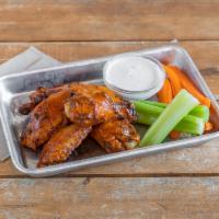 Wings · 6 wings with a choice of spicy Buffalo, BBQ, or mango habanero sauce, served with ranch dres...