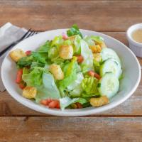 House Salad · Mixture of romaine and iceberg lettuce, tomatoes, cucumbers, mushrooms, pepperoncinis, and c...