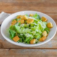 Caesar Salad · Romaine lettuce, shredded Parmesan cheese and croutons, served with Caesar dressing.