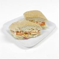 Chicken Chipotle Panini · Grilled chicken, mozzarella, tomatoes, red onions and chipotle mayo.
