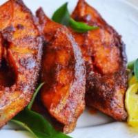 Tandoori Fish · Fresh fish of the day marinated in herbs and spices.