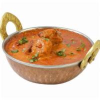 Lamb Masala · Traditional lamb curry in exotic spices.