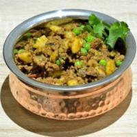 Keema Aloo Mattar · Minced leg of lamb with green peas, potatoes, and sauteed with spices.