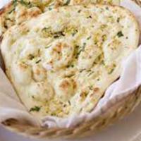 Garlic Naan · Naan with minced garlic and herbs.