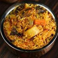 Vegetable Biryani · Mixed vegetables with basmati rice, onions, herbs, and spices.