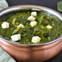 Palak Paneer · Cubes of homemade farmer’s cheese sauteed with fresh spinach and fenugreek.