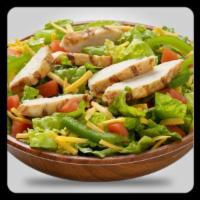Grilled Chicken Salad · Lettuce, tomatoes, onions, cheese and grilled chicken.