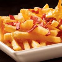 Loaded Bacon Cheddar Fries · Fries, melted cheddar cheese and bacon chips.