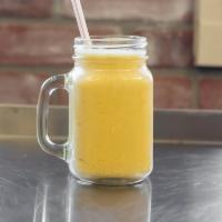 Mango Lasi · Mango flavored drink with yogurt and milk.