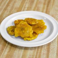 Fried Plantains · Tostones. Cooked in oil.