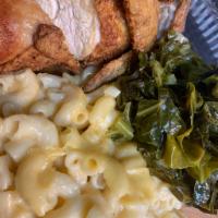 Fried Chicken Platter · Crispy, all-natural, fried chicken served with mac and cheese, collard greens, and yams. Col...