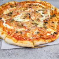 16. Capricciosa Pizza · Sliced prosciutto, fresh mushrooms, ricotta, Parmesan and mozzarella cheese with tomato sauce.