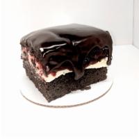 Devils Delight Cake · Chocolate cake filled with white chocolate mouse and strawberry preserves with a chocolate g...