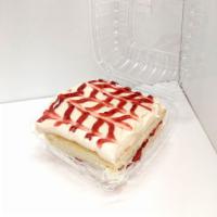 Raspberry Cream Cheese Cake · White cake with raspberry filling and cream cheese icing.