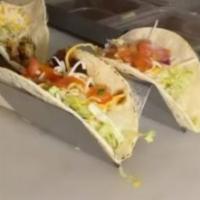 Street Taco · 3 tacos: shrimp, beef, chicken
Lettuce, Cheese, sour cream, pico