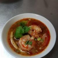 Tom Yum · Shrimp, lemongrass, bell pepper in spicy and sour soup.