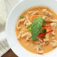 Red Curry · Red curry paste cooked in coconut milk, bell peppers, bamboo, zucchini, carrots and basil.