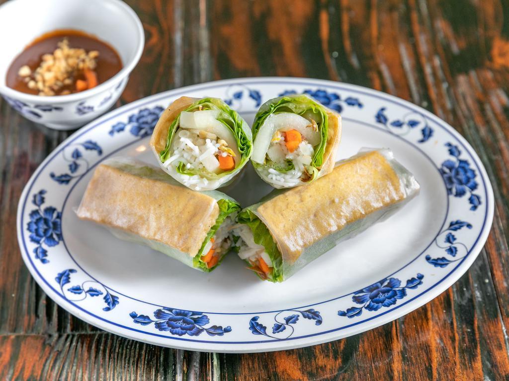 A4. Vegetarian Spring Rolls · 2 rice paper rolls stuffed with friend tofu, lettuce, fresh mint, bean sprouts, and vermicelli noodles. Served with peanut sauce.