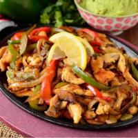 Chicken Fajitas · Cooked chicken with bell peppers, and onions. Served with rice, beans, guacamole salad, sour...