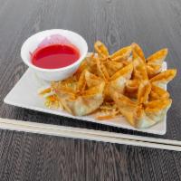 Crab Meat Cheese Wontons · 6 pieces. Fried crab meat and cream cheese wrapped wonton skin.