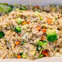Veggie Fried Rice · Steamed fried rice mixed with veggies, including carrots and broccoli.