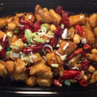 Kung Pao Chicken · Stir-fried Chinese dish with chicken, peanuts, green onion, and chili peppers in a spicy sav...