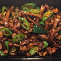 Spicy Stir-Fried Pork Hunan Style · Savory and spicy stir-fried pork and serrano pepper, marinated Hunan style.