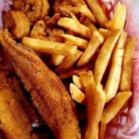 Fish Plates · 2 pieces of fish battered and fried.  Served with your choice of side and 2 slices of bread.