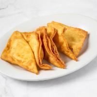 6 Crabmeat Rangoons · Fried wonton wrapper filled with crab and cream cheese.