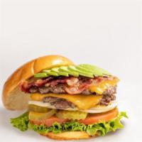 Deluxe Double · 1000 island, lettuce, tomato, pickles, onions, two Angus beef, cheddar cheese, beef bacon, a...