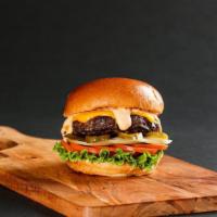 YoYo Black Angus Beef Burger · Brioche, 1000 island, lettuce, tomato, pickles, onions, smashed beef patty, and cheddar chee...