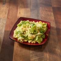 Caesar Salad · Crisp romaine lettuce with Caesar dressing and croutons.