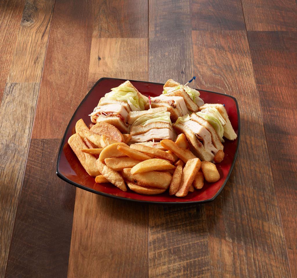 Turkey Breast and Bacon Club · Served with fries, lettuce and tomato.