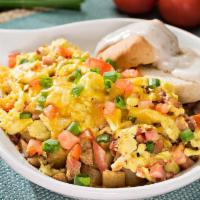 Farmers Skillet · Smoked ham, crisp bacon, tomatoes, green onions, and country potatoes all tossed with scramb...