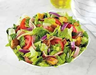 Family Italian Chef Salad · Fresh-cut lettuce blend, ham, salami, provolone cheese, sliced tomatoes, red onions and croutons made daily; served with Italian dressing.