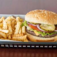 Cheeseburger Combo · 1/3 lb. patty with cheese on a bun. Served with fries or chips and small fountain drink.