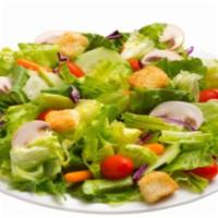 Garden Salad · Fresh, mixed green salad with mushrooms, tomatoes, cucumbers, carrots and garlic Parmesan cr...