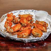 Traditional Wings · Hot and spicy, BBQ, oven roasted, mango habanero and Italian.