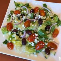 Greek Salad · Crisp romaine lettuce, red onion, cucumber, cherry tomatoes, Kalamata olives and feta cheese.