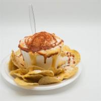 Elote Chorreado · Corn, mayonnaise, chilli powder, butter, fresh lemon, valentina sauce, tortilla chips, and n...
