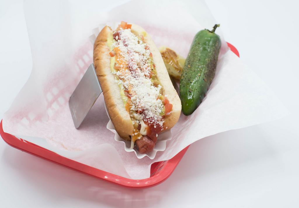 Chico Hotdog · Small. Tomatoes, guacamole, mayonaise, jalapeno sauce, grilled onions, chipotle, and ketchup.