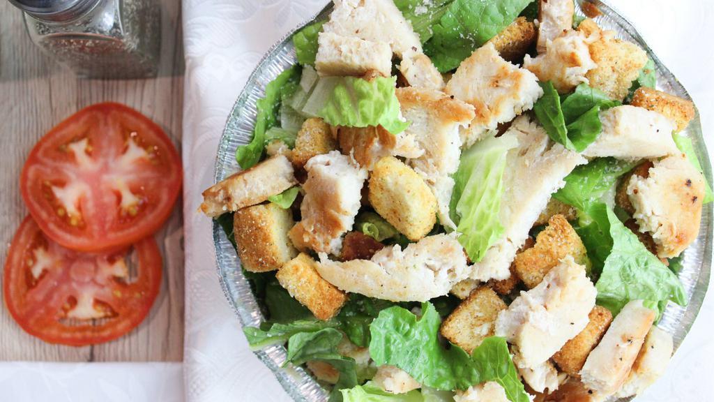 Caesar Salad · Croutons and parmesan cheese served with Caesar dressing.