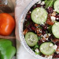 Cranberry Pecan Salad · Feta cheese, cucumber, tomatoes, cranberries, and pecans.